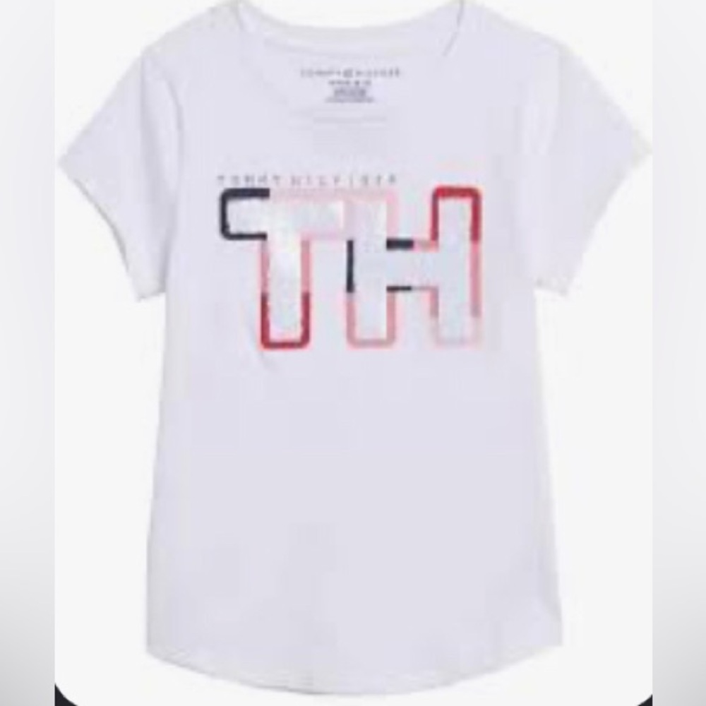 Tommy Hilfiger girl's white t-shirt features prominent "TH"
